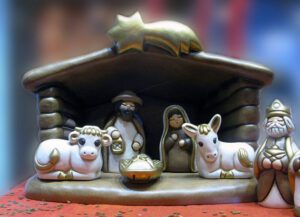 A statue of a manger and animals.