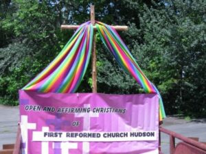 A banner with the words open and adoration of first reformed church hudson.