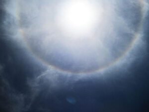 A ring of light is seen in the sky.