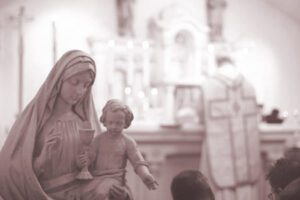 A statue of the virgin and child in a church.