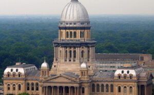 An aerial view of an ornate building with a dome.