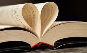 A heart shaped book on a table.