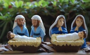 A nativity scene with figurines of jesus, mary, and joseph.