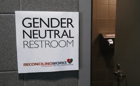 A sign that says gender neutral restroom.