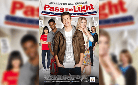 A poster for pass l'light with a group of people standing in front of it.