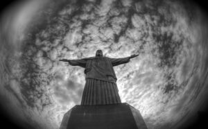 A black and white photo of the christ statue in rio.