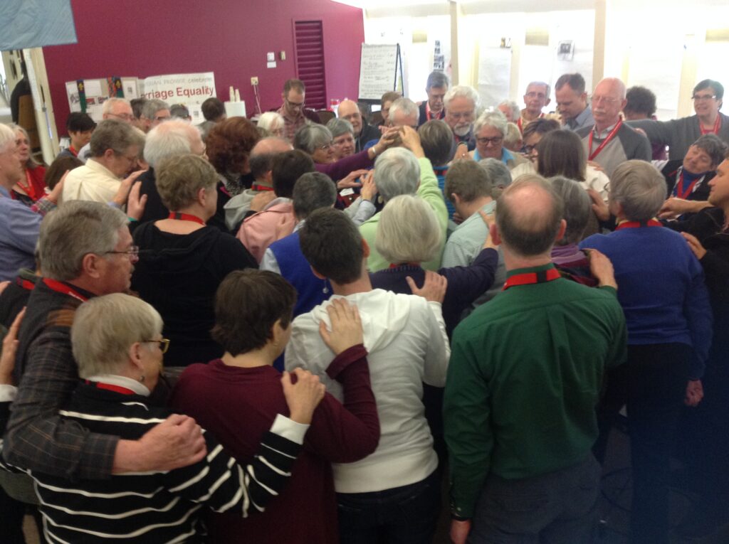 A group of people in a room.