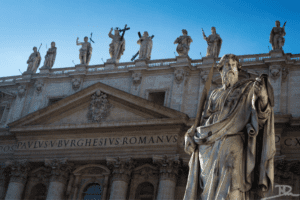 A statue in front of a building.