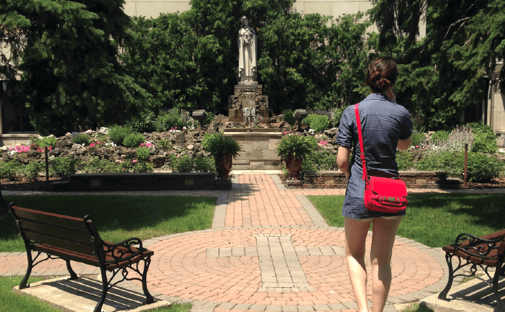 A woman walking in a park.