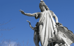 A statue of a woman holding an eagle.