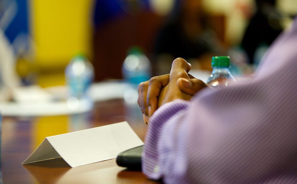 A group of people sitting at a table.