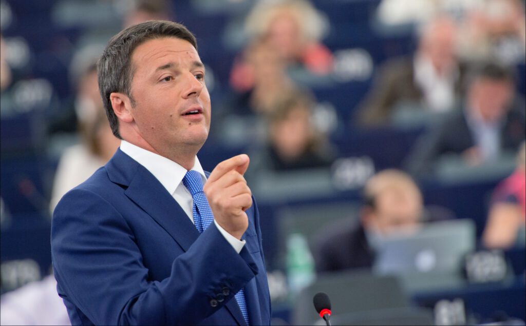 A man in a suit giving a speech in the european parliament.