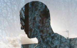 A silhouette of a man's head.