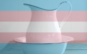 A pitcher with a transgender flag on it.