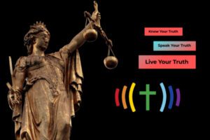 A statue of justice with the words live your truth.